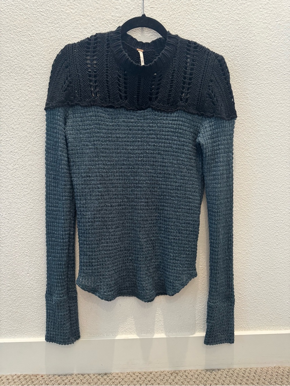 Free People Snowflake Sweater in a teal ocean and black colorblock combination